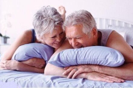 elderly couple in bed